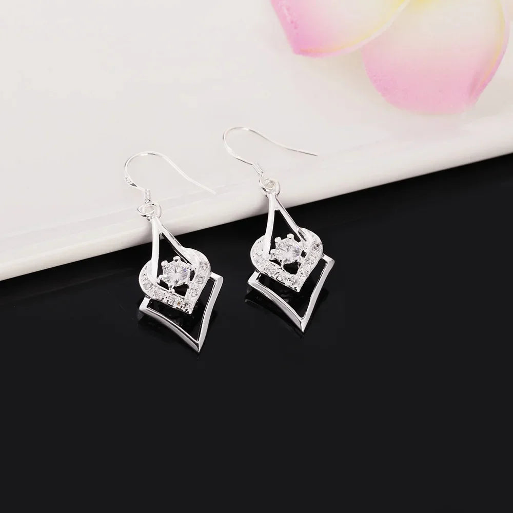 Boucles d'oreilles en topaze blanche et argent sterling