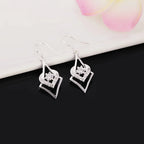 Boucles d'oreilles en topaze blanche et argent sterling