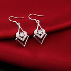 Boucles d'oreilles en topaze blanche et argent sterling