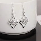 Boucles d'oreilles en topaze blanche et argent sterling